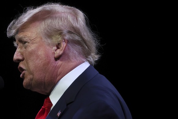 Former President Donald Trump speaks to the crowd gathered at the Landers Center in Southaven, Miss., on Saturday, June 18, 2022. (Joe Rondone/The Commercial Appeal via AP)