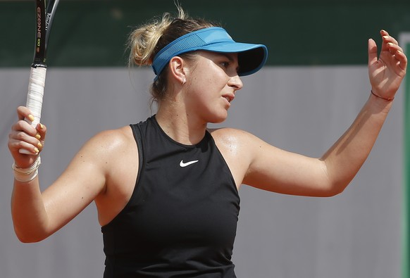 Belinda Bencic of Switzerland reacts as he plays Slovakia&#039;s Magdalena Rybarikova during their second round match of the French Open tennis tournament at the Roland Garros stadium, Thursday, May 3 ...