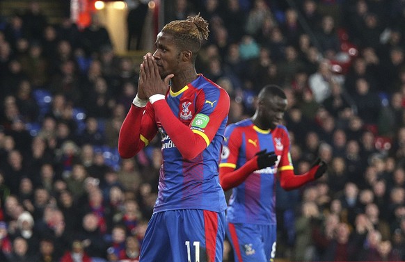 Crystal Palace&#039;s Wilfried Zaha reacts, during the English Premier League soccer match between Crystal Palace and Cardiff City at Selhurst Park, in London, Wednesday Dec. 26, 2018. (Yui Mok/PA via ...