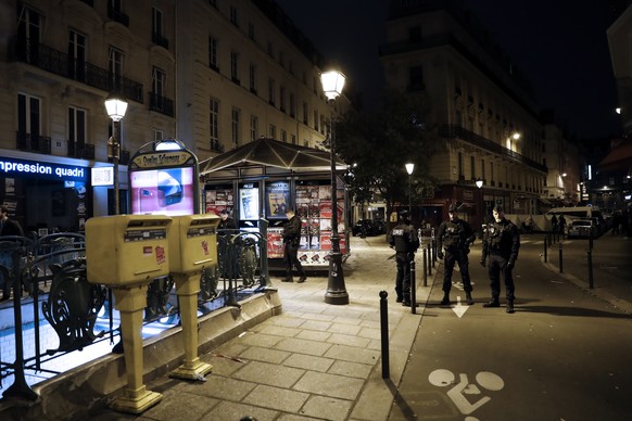 epa06732221 French police stand guard next to the place where a man attacked and stabbed several people in Paris, France, 12 May 2018. According to the latest reports, two persons are dead including t ...