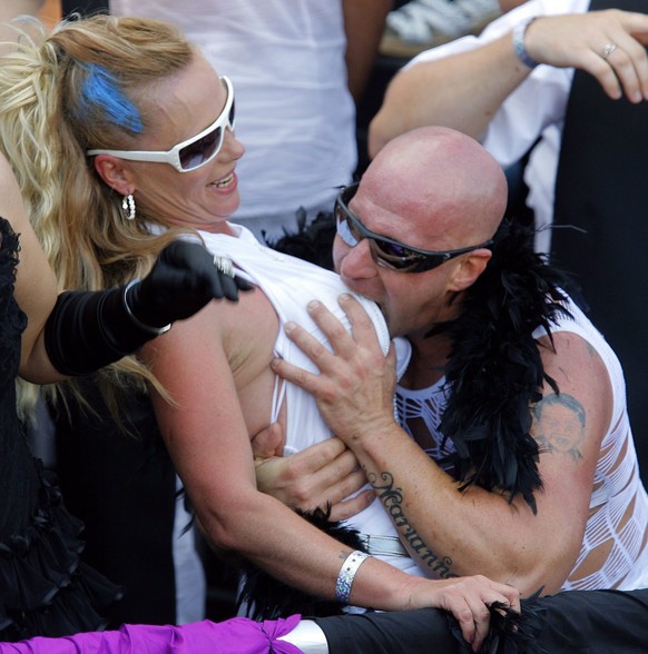 Two raver perform during the 17th Street Parade in Zurich, Switzerland, Saturday, August 9, 2008. (KEYSTONE/Eddy Risch)