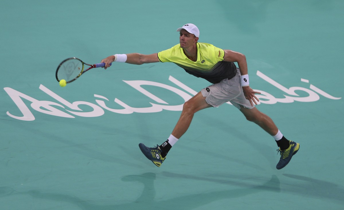 South Africa's Kevin Anderson returns the ball to Austria's Dominic Thiem during the second day of the Mubadala World Tennis Championship in Abu Dhabi, United Arab Emirates, Friday, Dec. 29, ...