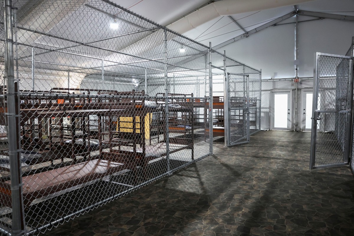 U.S. President Donald Trump, Florida Governor Ron DeSantis and U.S. Homeland Security Secretary Kristi Noem visit a temporary migrant detention center informally known as "Alligator Alcatraz&quot ...