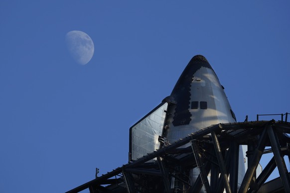 The moon rises over SpaceX&#039;s mega rocket Starship as it is prepares for a test launch Saturday, Oct. 12, 2024, in Boca Chica, Texas. (AP Photo/Eric Gay)