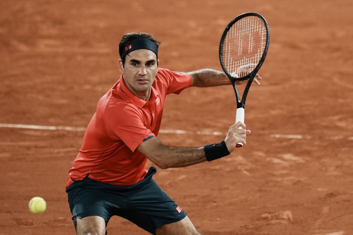 Switzerland's Roger Federer plays a return to Germany's Dominik Koepfer during their third round match on day 7, of the French Open tennis tournament at Roland Garros in Paris, France, Satur ...