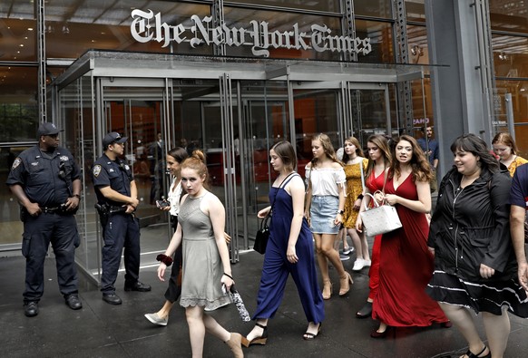 epaselect epa06848849 New York City police are seen out front of the New York Times Building on Eighth Avenue in New York, New York, USA, 28 June 2018. New York City police are taking precautionary me ...