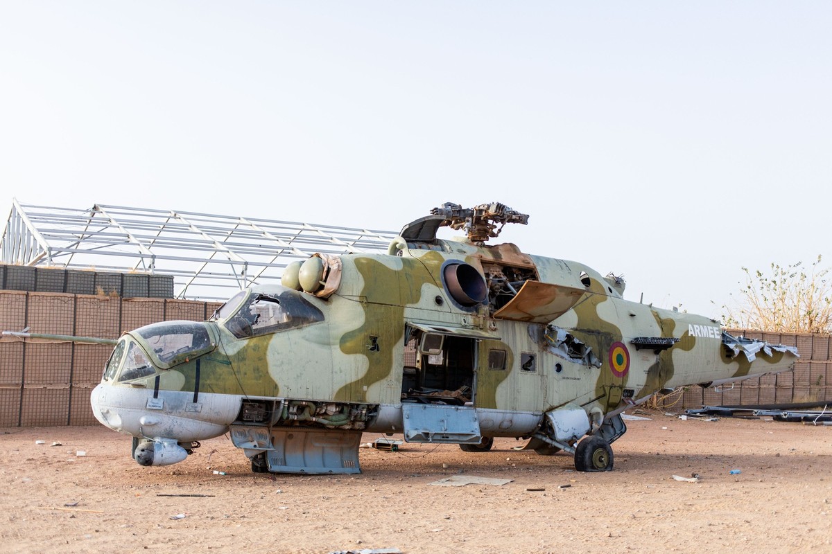 A general view of the damaged Mi-24 helicopter, an attack and troop transportation helicopter, at the former Africa Corps barracks at Camp 2 in Kidal on May 11, 2026. Strategic towns, including Kidal  ...