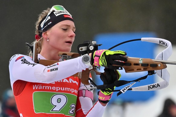 epa10395454 Amy Baserga of Switzerland in action during the Single Mixed Relay M+W race of the IBU Biathlon World Cup in Pokljuka, Slovenia, 08 January 2023 EPA/IGOR KUPLJENIK