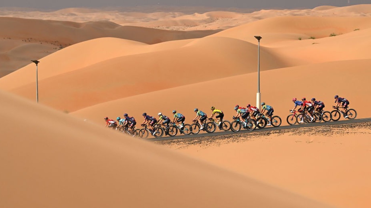 LIWA PALACE - ABU DHABI, UNITED ARAB EMIRATES - FEBRUARY 17: A general view of the peloton competing during the to the 7th UAE Tour, Stage 1 a 138km stage from Madinat Zayed Shams Solar Park to Liwa P ...