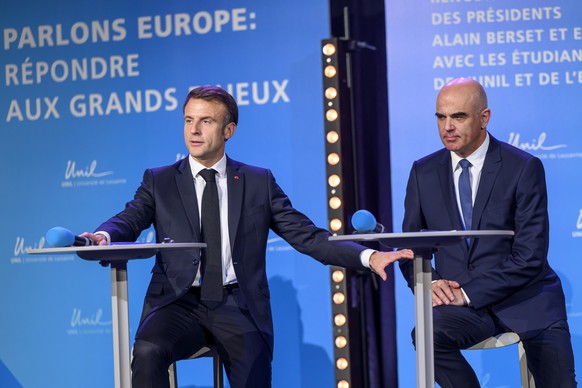 epa10978128 French President Emmanuel Macron (L) and Swiss President Alain Berset (R), attend a public conference on the theme &#039;Let&#039;s Talk Europe responding to major current societal issues& ...