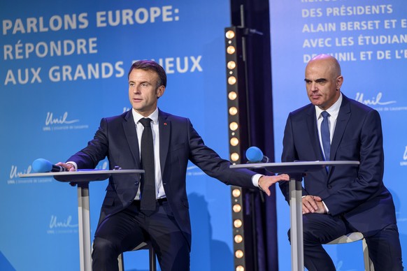 epa10978128 French President Emmanuel Macron (L) and Swiss President Alain Berset (R) attend a public conference on the theme 'Let's Talk Europe, responding to major current social issues'.