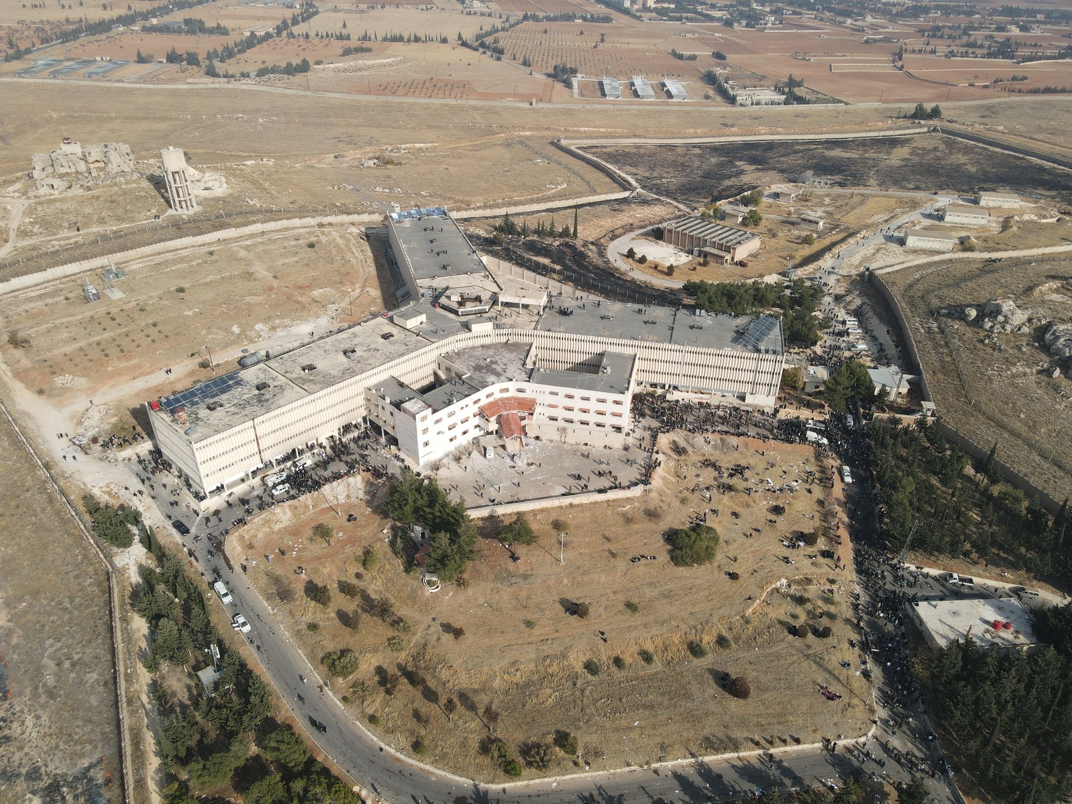 epa11766642 An aerial picture taken with a drone shows Sednaya prison, dubbed by Amnesty International as the &#039;Human Slaughterhouse&#039;, near Damascus, Syria, 09 December 2024. The Political Af ...