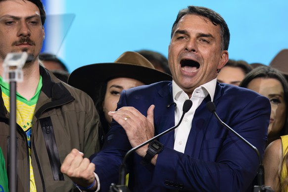 epa13132809 Brazilian Senator Flavio Bolsonaro reacts during the national convention of Brazil's Liberal Party (PL) in Sao Paulo, Brazil, 25 July 2026. The Liberal Party, led by former President  ...