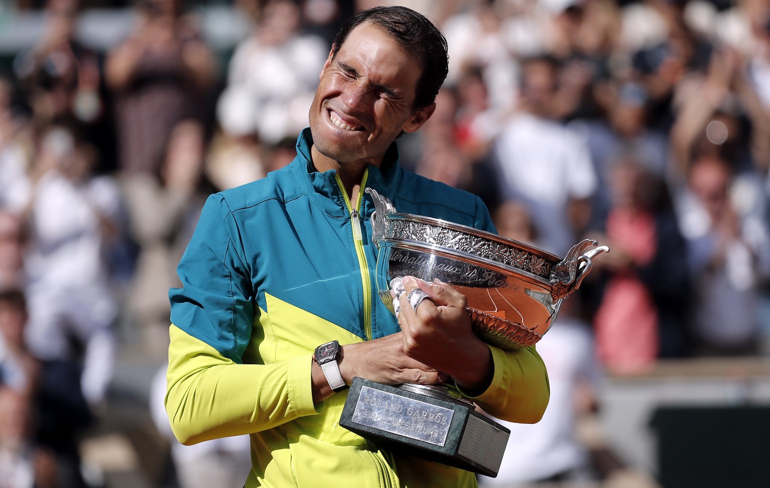 epa09997636 Rafael Nadal of Spain celebrates with the trophy La Coupe des Mousquetaires after winning against Casper Ruud of Norway in their Men?s Singles final match during the French Open tennis tou ...