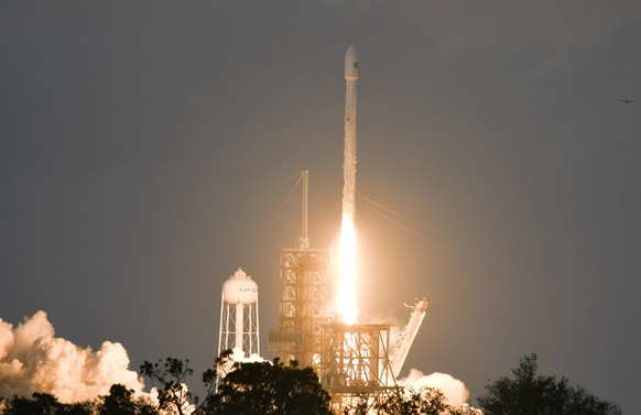 A SpaceX Falcon lifts off from Kennedy Space Center, Wednesday, Oct. 11, 2017, in Cape Canaveral, Fla. The unmanned Falcon, recycled following a February flight, blasted off with a satellite. Minutes  ...