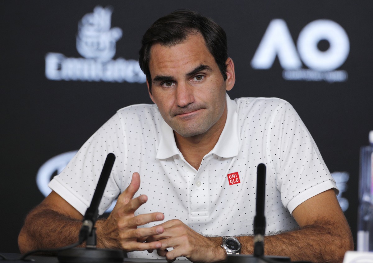 Switzerland's Roger Federer answers questions during a press conference ahead of the Australian Open tennis championship in Melbourne, Australia, Saturday, Jan. 18, 2020. (AP Photo/Andy Wong)
