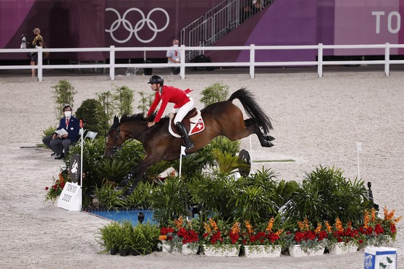 Steve Guerdat of Switzerland riding Venard de Cerisy competes in the equestrian jumping individual qualifier at the 2020 Tokyo Summer Olympics in Tokyo, Japan, on Tuesday, August 03, 2021. (KEYSTONE/P ...