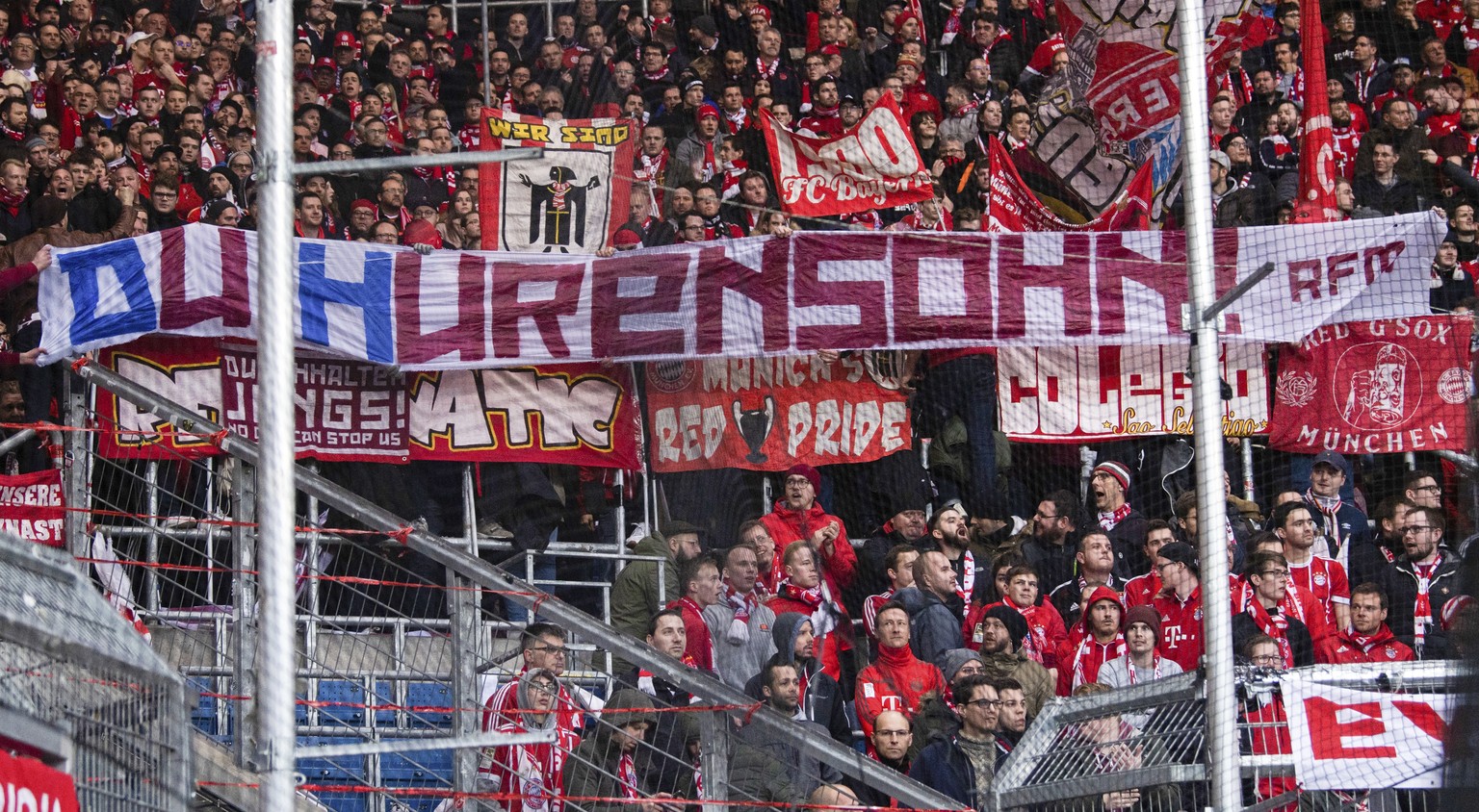 Bayern Munich supporters lift a banner reading &#039;You son of a bitch&#039; against Hoffenheim club patron Dietmar Hopp during the German Bundesliga soccer match between TSG Hoffenheim and FC Bayern ...