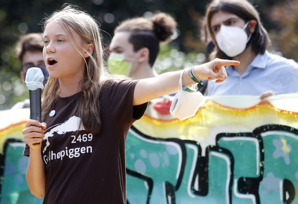 epa09499766 Swedish environmental activist Greta Thunberg speaks at the end of a &#039;Fridays for Future&#039; strike protest in Milan, Italy, 01 October 2021. EPA/MATTEO BAZZI