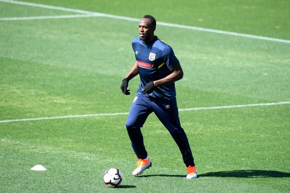 epa06961519 Eight-time Olympic sprinting gold medalist Usain Bolt takes part in his first training session with the Central Coast Mariners at Central Coast Stadium in Gosford, Australia, 21 August 201 ...