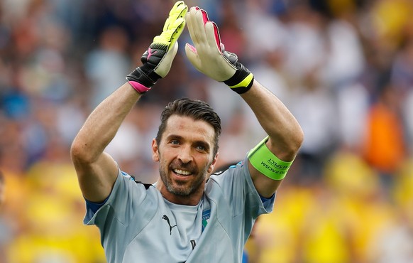 Italy goalkeeper Gianluigi Buffon celebrates at the end of the Euro 2016 Group E soccer match between Italy and Sweden at the Stadium municipal in Toulouse, France, Friday, June 17, 2016. Italy won 1- ...