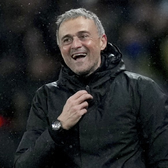 PSG&#039;s head coach Luis Enrique smiles at the end of a Champions League opening phase soccer match between Paris Saint-Germain and Manchester City at the Parc des Princes in Paris, Wednesday, Jan.  ...