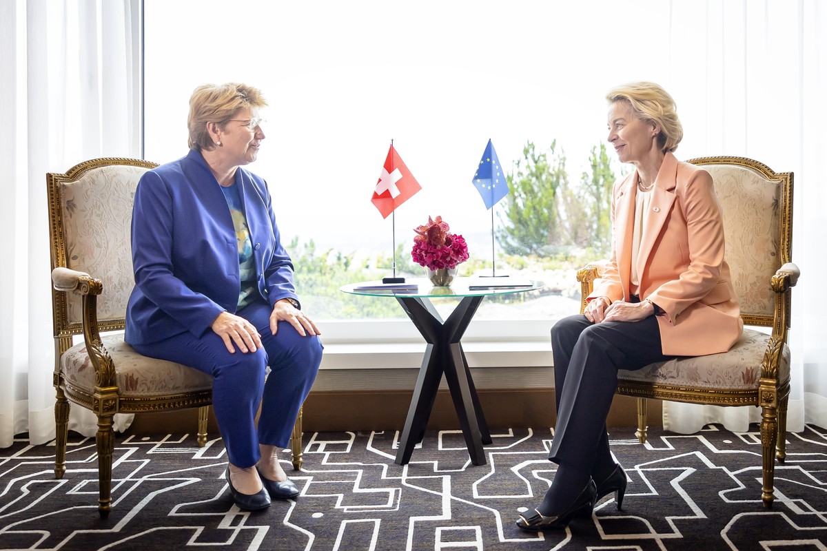 Swiss Federal President Viola Amherd, left, speaks to Ursula von der Leyen President of European Commission, right, as they meet for a bilateral talk during the Summit on peace in Ukraine, in Stanssta ...