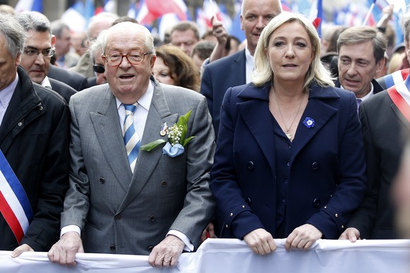 epa11811016 (FILE) - Former President of the Front National (FN) Jean-Marie Le Pen (L) and her daughter and actual President of the party Marine Le Pen (R) taking part in the party&#039;s traditional  ...