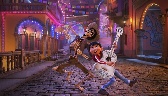 In this image released by Disney-Pixar, character Hector, voiced by Gael Garcia Bernal, left, and Miguel, voiced by Anthony Gonzalez, appear in a scene from the animated film, &quot;Coco.&quot; (Disne ...