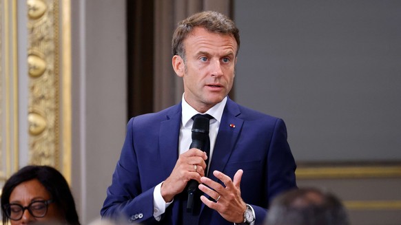 French President Emmanuel Macron addresses mayors of cities affected by the violent clashes that erupted after a teen was shot dead by police last week during a meeting at the presidential Elysee Pala ...