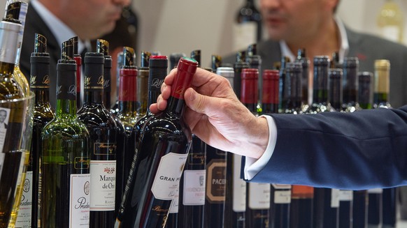 epa07567704 Wine bottles are seen at Vinexpo Bordeaux 2019 fair in Bordeaux on day one, France, 13 May 2019. According to the organizers, VinExpo runs in Bordeaux from 13 to 16 May 2019 and hosts 800  ...