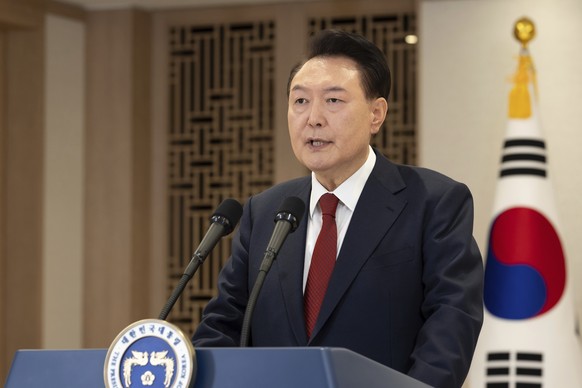 In this photo provided by South Korea Presidential Office, South Korean President Yoon Suk Yeol speaks at the presidential office in Seoul, South Korea, Thursday, Dec. 12, 2024. (South Korea President ...