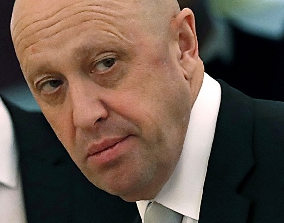 FILE - Russian businessman Yevgeny Prigozhin is shown prior to a meeting of Russian President Vladimir Putin and Chinese President Xi Jinping in the Kremlin in Moscow, Russia, on Tuesday, July 4, 2017 ...