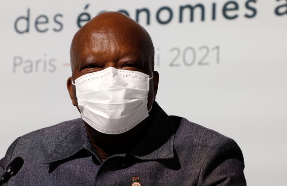 epa09208778 Burkina Faso's President Roch Marc Christian Kabore poses before the opening session of the Summit on the Financing of African Economies in Paris, France, 18 May 2021. EPA/LUDOVIC MAR ...