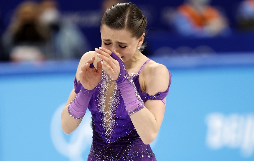 epa09759494 Kamila Valieva of Russia reacts before the Women&#039;s Short Program of the Figure Skating events at the Beijing 2022 Olympic Games, Beijing, China, 15 February 2022. EPA/HOW HWEE YOUNG