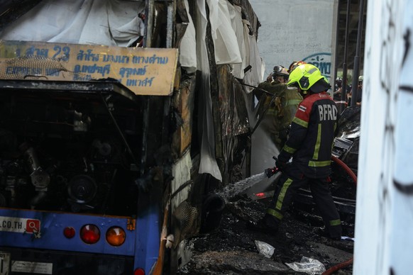 May 16, 2026, Bangkok, Bangkok, Thailand: A train collided with a bus stranded on railway tracks, triggering a fire that engulfed the vehicle, leaving multiple people injured and dead in Bangkok, Thai ...