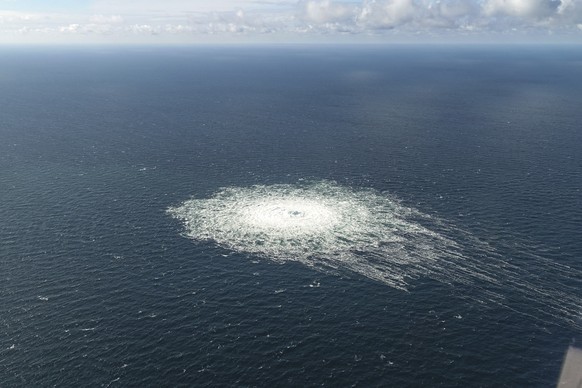 A large disturbance in the sea can be observed off the coast of the Danish island of Bornholm Tuesday, Sept. 27, 2022 following a series of unusual leaks on two natural gas pipelines running from Russ ...