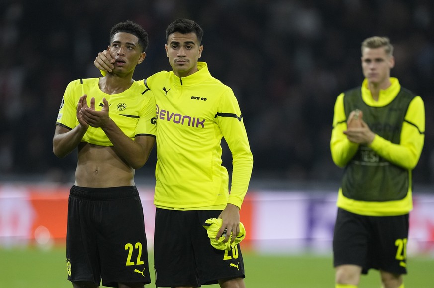 Dortmund players leave the field after the Champions League group C soccer match between Ajax and Borussia Dortmund at the Johan Cruyff ArenA in Amsterdam, Netherlands, Tuesday, Oct. 19, 2021. (AP Pho ...