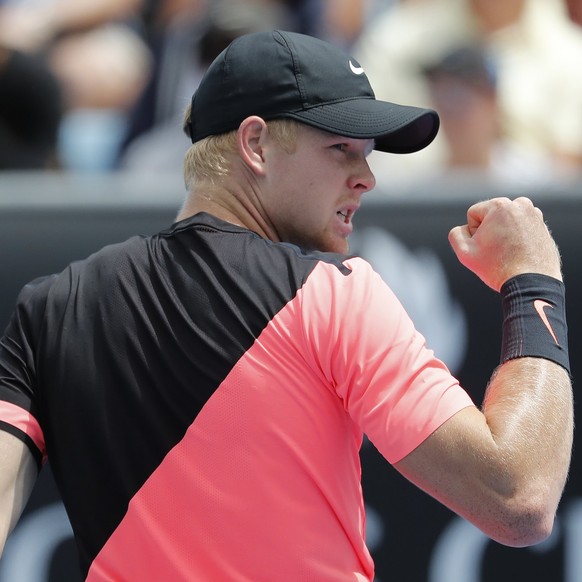 epa06439603 Kyle Edmund of Britain reacts during his first round match against Kevin Anderson of South Africa at the Australian Open Grand Slam tennis tournament in Melbourne, Australia, 15 January 20 ...