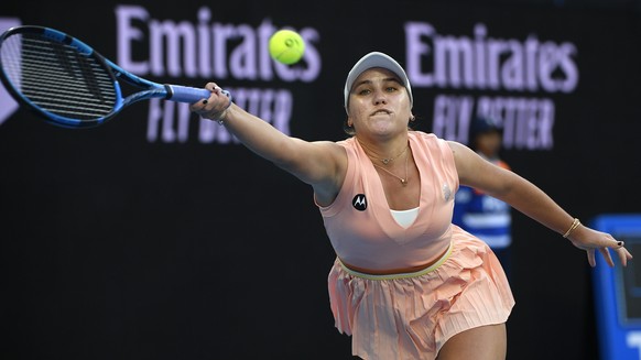 Sofia Kenin of the U.S. plays a forehand return to compatriot Madison Keys during their first round match at the Australian Open tennis championships in Melbourne, Australia, Monday, Jan. 17, 2022. (A ...