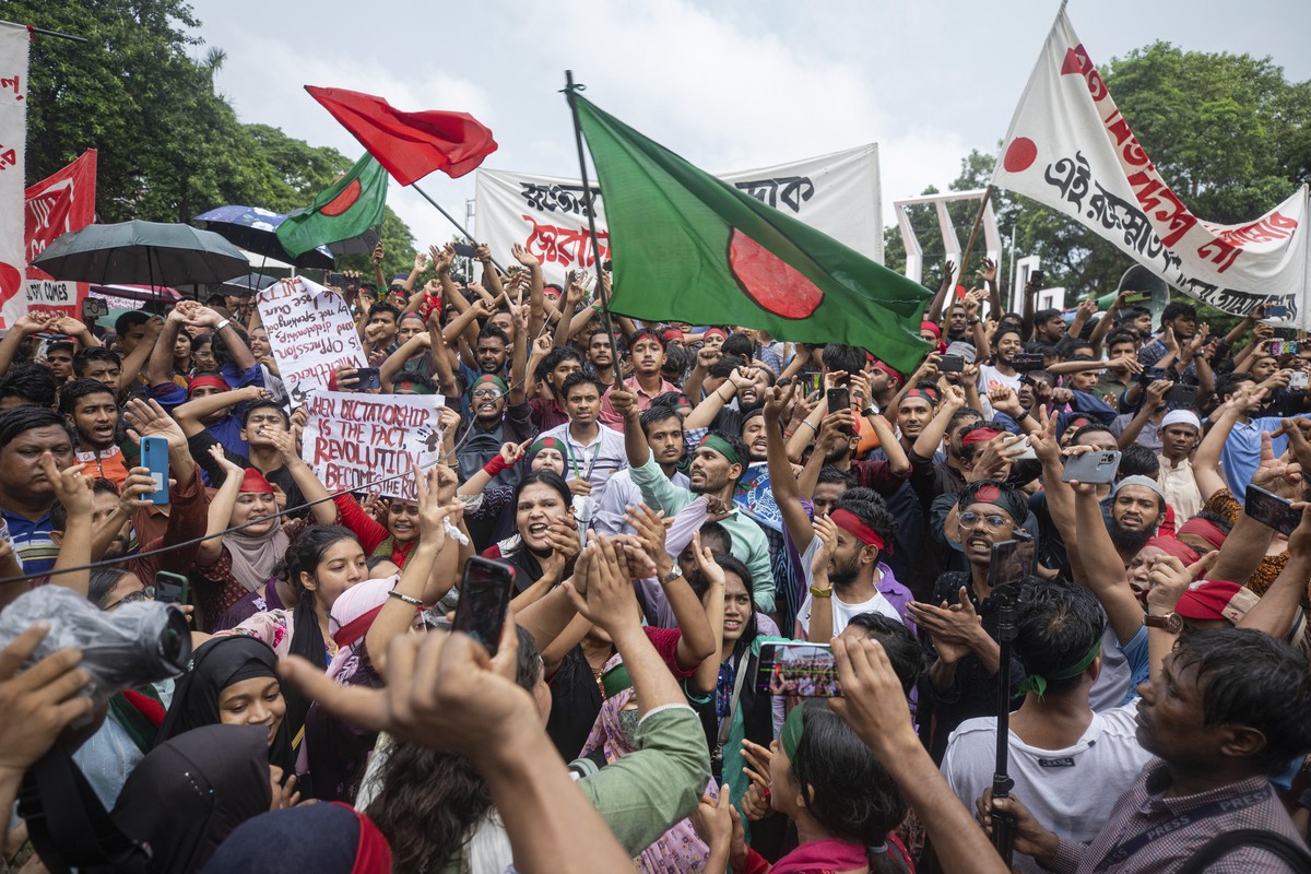 Activists take part in a protest march against Prime Minister Sheikh Hasina and her government to demand justice for more than 200 people killed in last month's violent demonstrations, in Dhaka,  ...