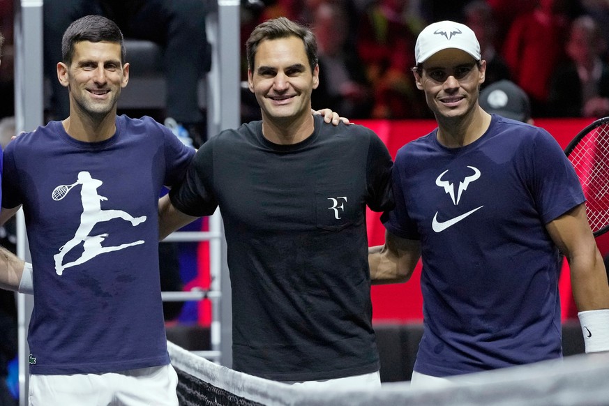 FILE - From left, Serbia's Novak Djokovic, Switzerland's Roger Federer and Spain's Rafael Nadal attend a training session ahead of the Laver Cup tennis tournament at O2 in London, Thurs ...