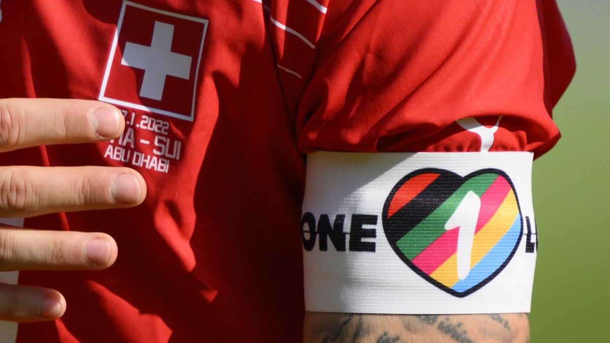 Close up of Switzerland's midfielder Granit Xhaka with the "One Love" captains arm band as he sings the national anthem during a friendly soccer match between Switzerland and Ghana in p ...