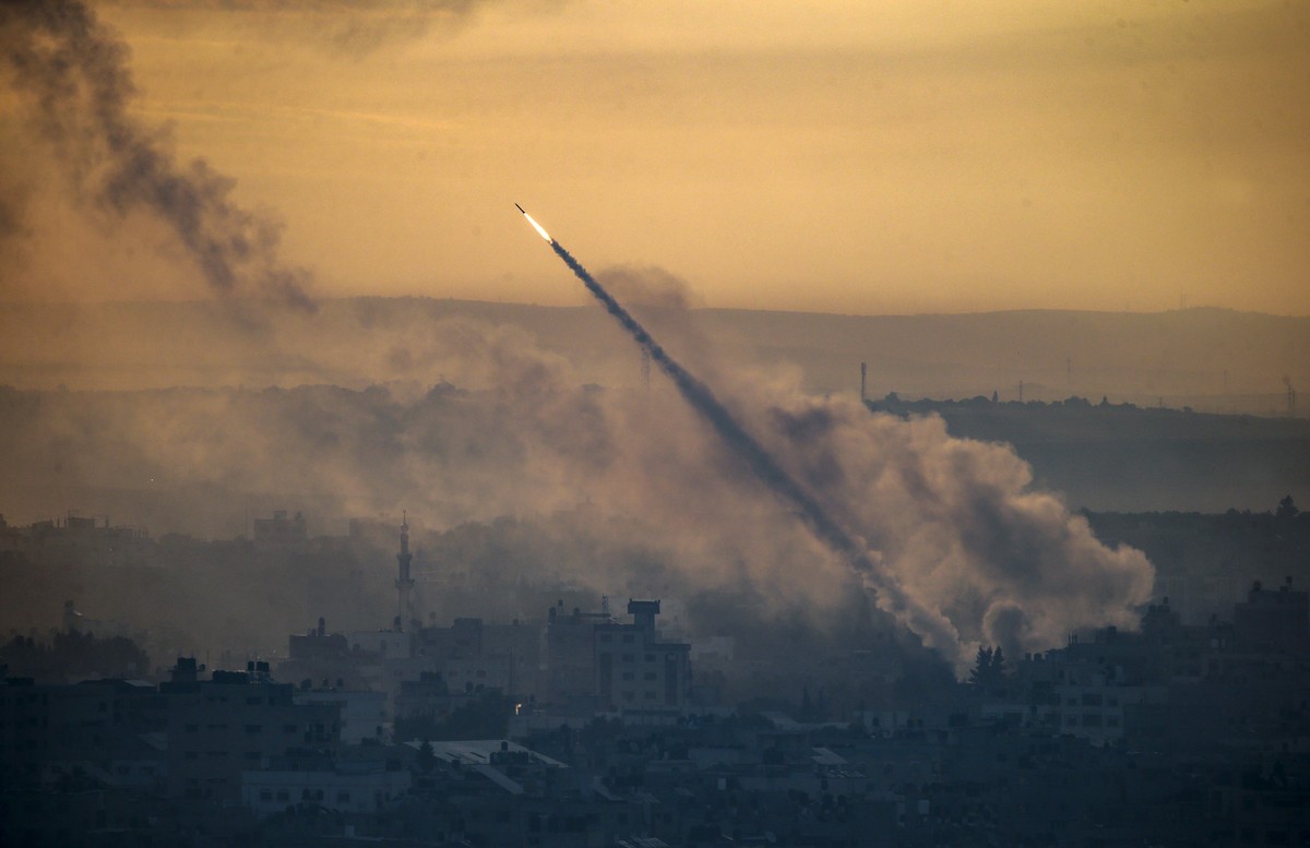 epa11638058 (FILE) - A rocket is launched from the coastal Gaza strip towards Israel by militants of the Ezz Al-Din Al Qassam militia, the military wing of Hamas movement, in Gaza City, 07 October 202 ...