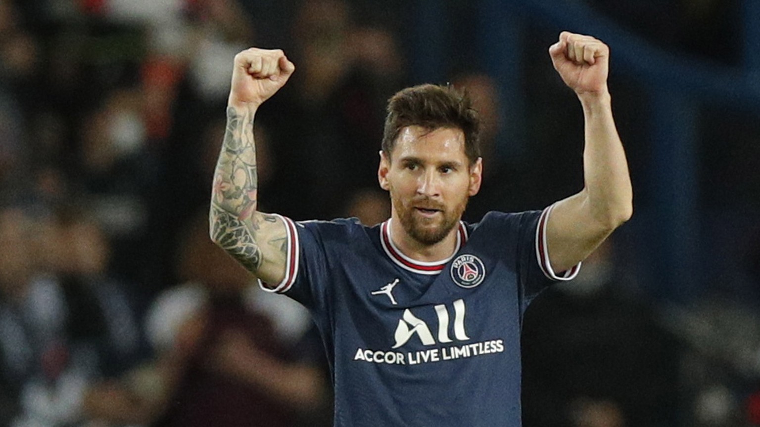 epa09494371 Paris Saint Germain&#039;s Lionel Messi celebrates scoring the 2-0 lead during the UEFA Champions League group A soccer match between PSG and Manchester City at the Parc des Princes stadiu ...