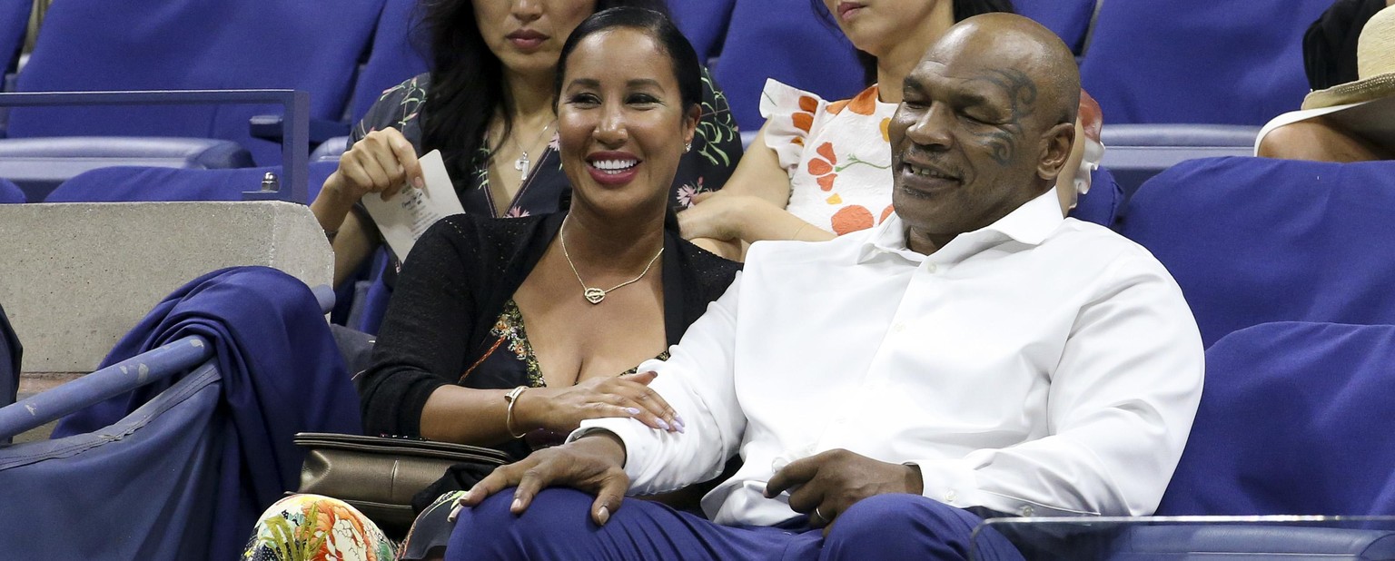 NEW YORK, NY - AUGUST 27: Mike Tyson and his wife Lakiha Spicer attend the opening night gala of the 2018 tennis US Open held at Arthur Ashe stadium of the USTA Billie Jean King National Tennis Center ...