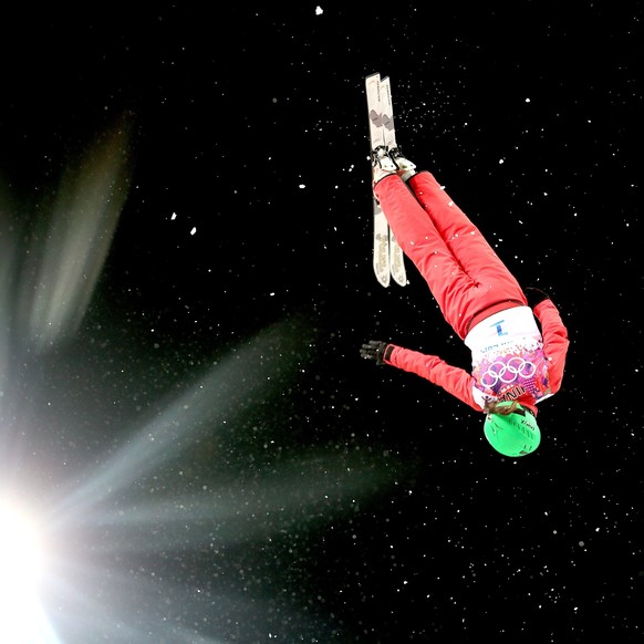 epa04077908 Li Nina of China in action during the Women&#039;s Aerials Final at the Sochi 2014 Olympic Games, Krasnaya Polyana, Russia, 14 February 2014. EPA/SERGEY ILNITSKY