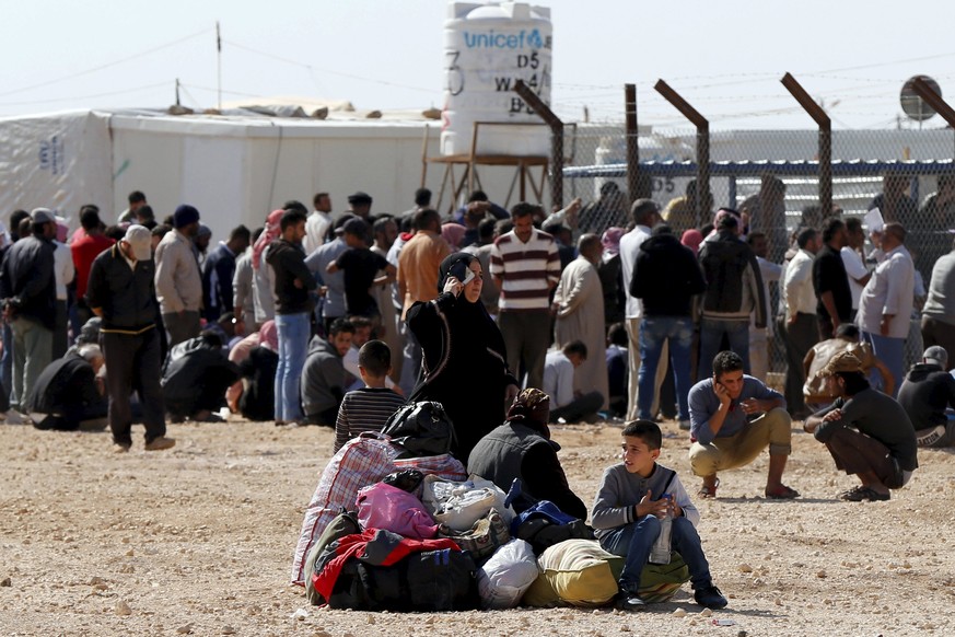 Flüchtlinge aus Syrien warten auf die Registrierung im jordanischen Camp al-Zaatari.<br data-editable="remove">