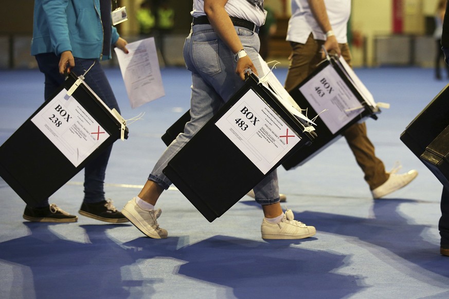 Ballot boxes arrive to be counted, at the Emirates Arena in Glasgow, Scotland, Thursday June 8, 2017. ﻿Britain voted Thursday in an election that started out as an attempt by Prime Minister Theresa Ma ...