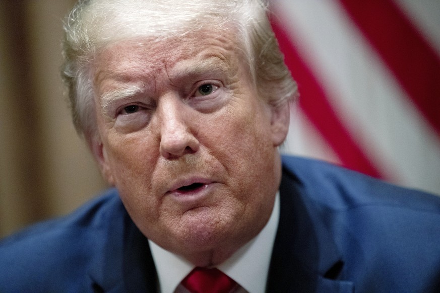 In this June 10, 2020 photo, President Donald Trump speaks during a roundtable discussion in the Cabinet Room of the White House in Washington. Trump has lobbed a broadside attack against the Internat ...